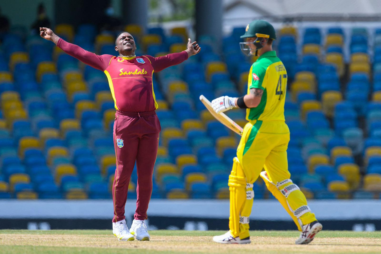 Sheldon Cottrell celebrates the dismissal of Ben McDermott