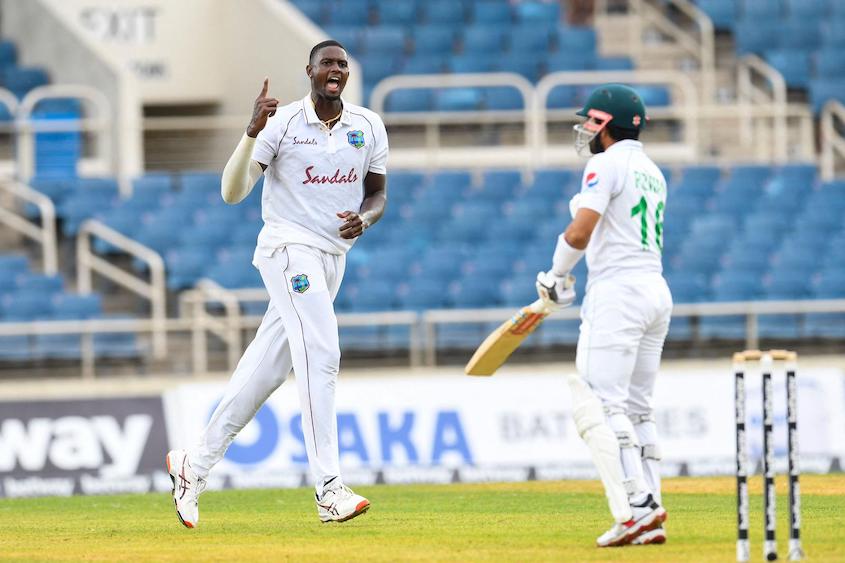 Jason Holder celebrates the dismissal of Mohammad Rizwan
