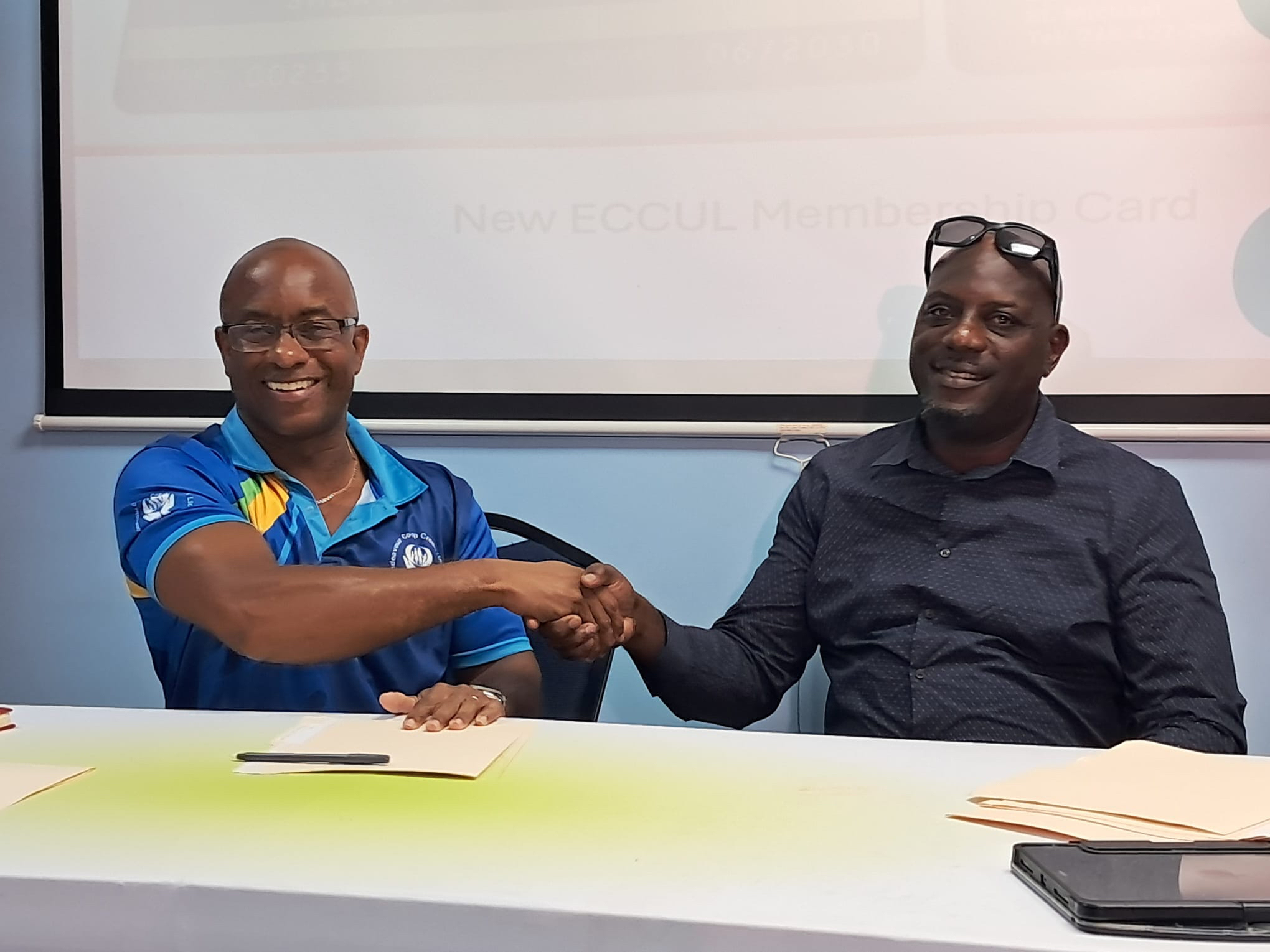 11 small businesses and credit union sign deal