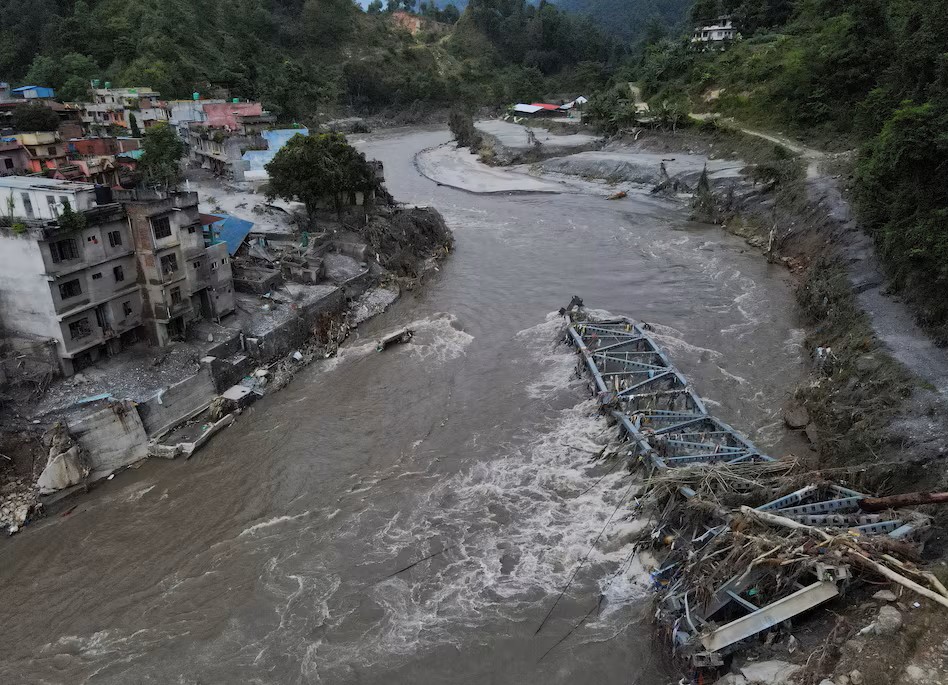 Nepal and China resume flood rescue after lake threat eases, death toll nears 600